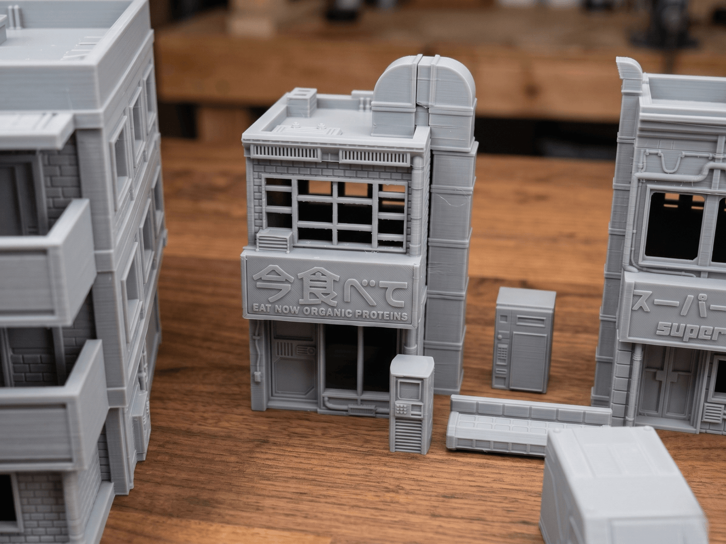 Cyberpunk City Terrain Bundle – 5 Buildings, 3 Vehicles & Scatter (28mm/32mm/40mm) - Northern Foundry