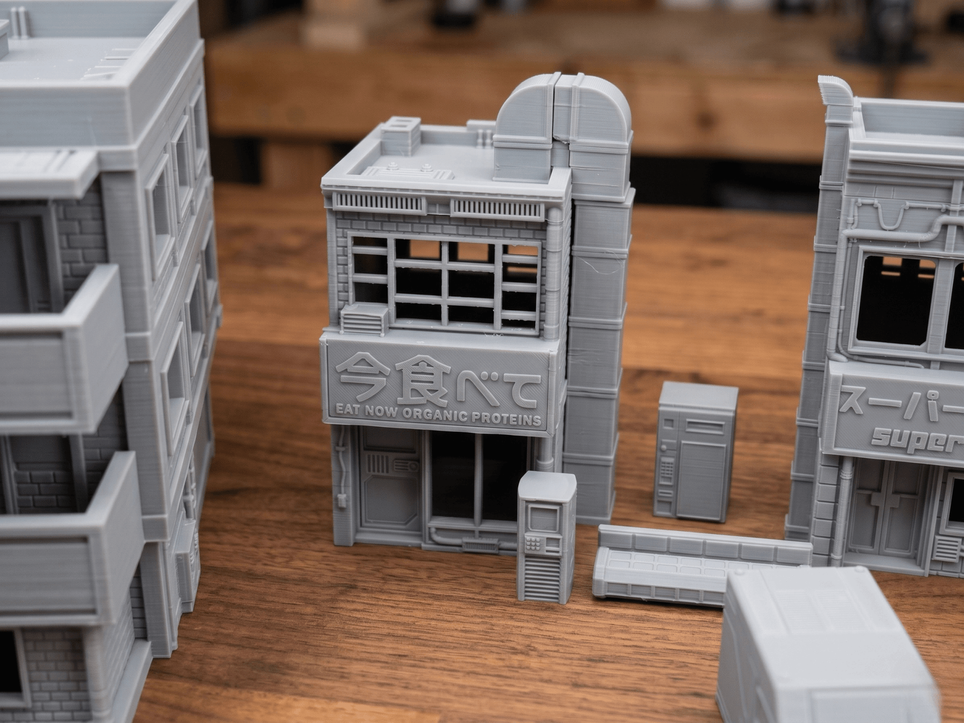 Cyberpunk City Terrain Bundle – 5 Buildings, 3 Vehicles & Scatter (28mm/32mm/40mm) - Northern Foundry